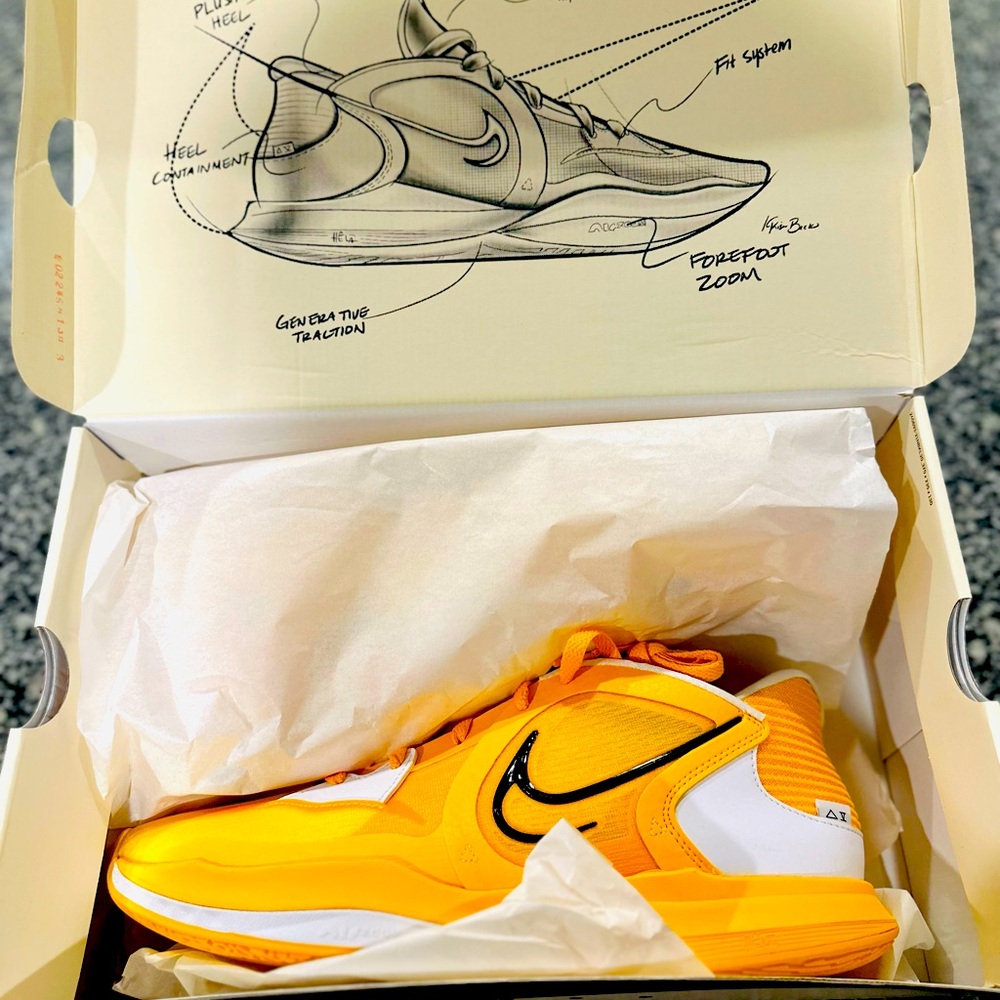 Brand new Yellow Kyrie Low 5 size 13. It comes in a box .Never worn.
